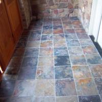 I installed the multi-colored slate tile after the door unit was complete.